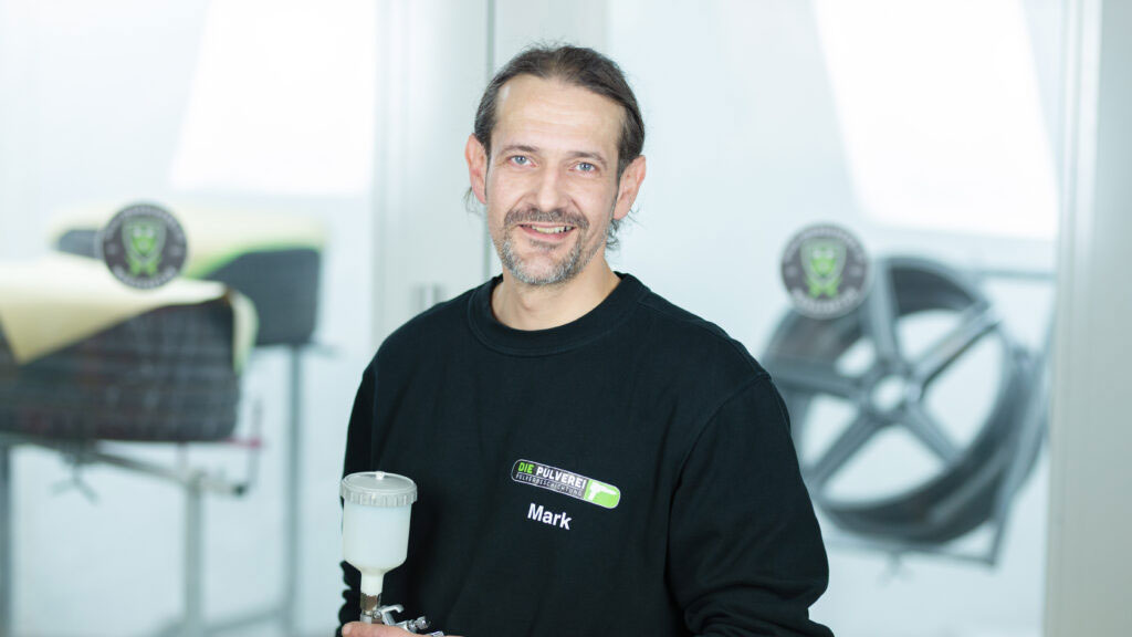 MARK HOLZER